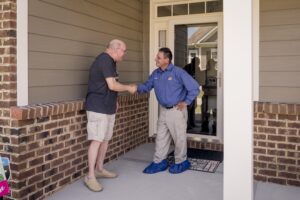 Welcoming Technician For Ductless AC Installation